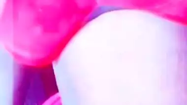 Desi model touches her XXX twins under pink bra and films her slit