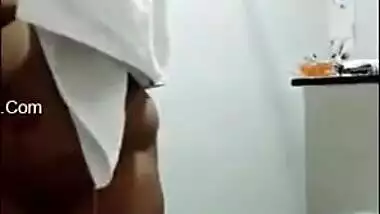 Pregnant aunty of Indian origin puts on clothes after taking a shower