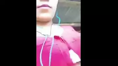 Beautiful teen plays with her firm boobs while on a video call with lover