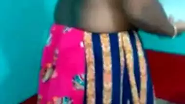 Hot like hell Desi female in sexy pink dress poses for the camera