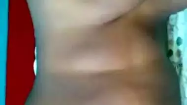 Dude plays with big XXX tits of his naked Desi wife for home video