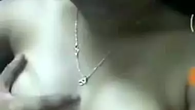 Girl with Indian features takes bra off exposing her boobs in sex show