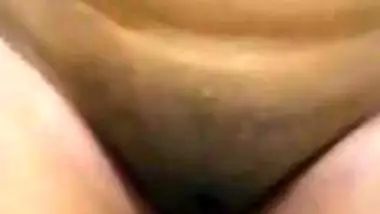 Sexy Desi girl flaunts her sex boobs and XXX snatch holding the camera