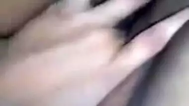 Horny Desi gal displays saggy tits and also fingers her XXX cunny