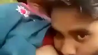 Indian outdoor sex of a guy sucking his GF’s tight boobs