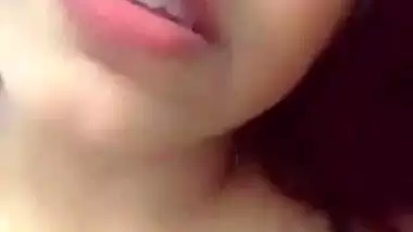 Horny girlfriend playing with her big boobs