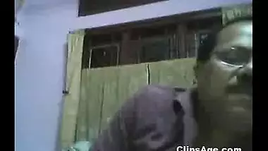 Bank manager working in Assam sucking boobs of his wife on webcam